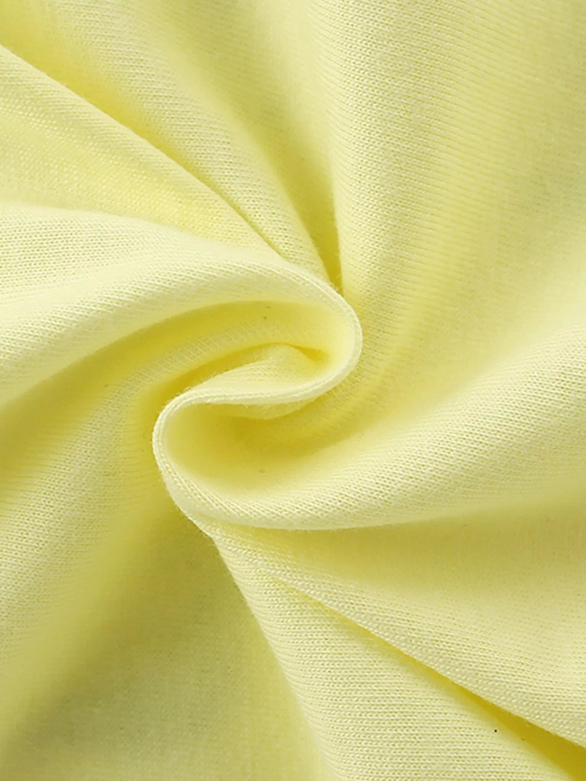 Yellow daisy graphic shirt — yellow fabric