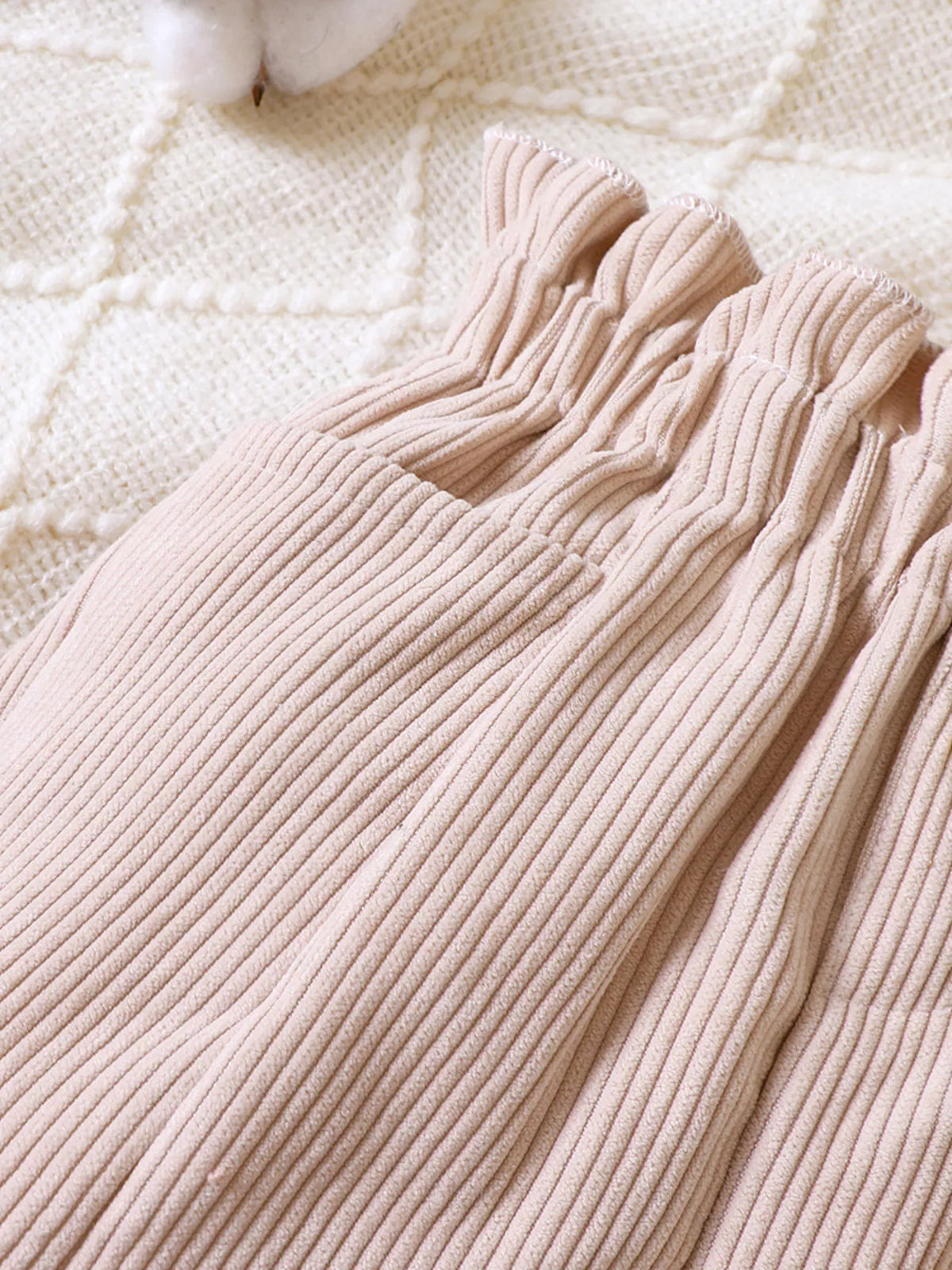 Beige gathered waistband and cord texture