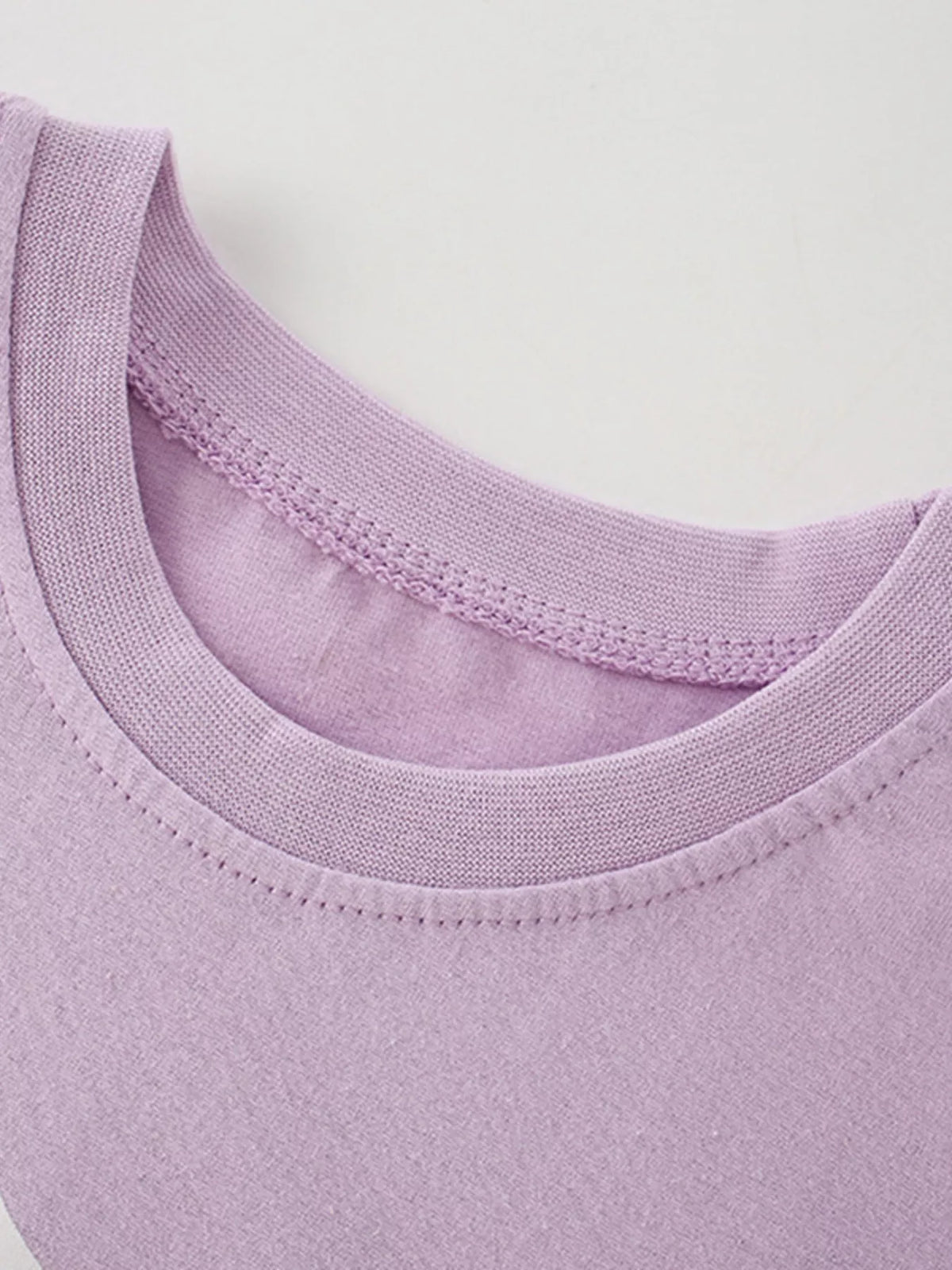 Lavender unicorn graphic shirt — round neckline