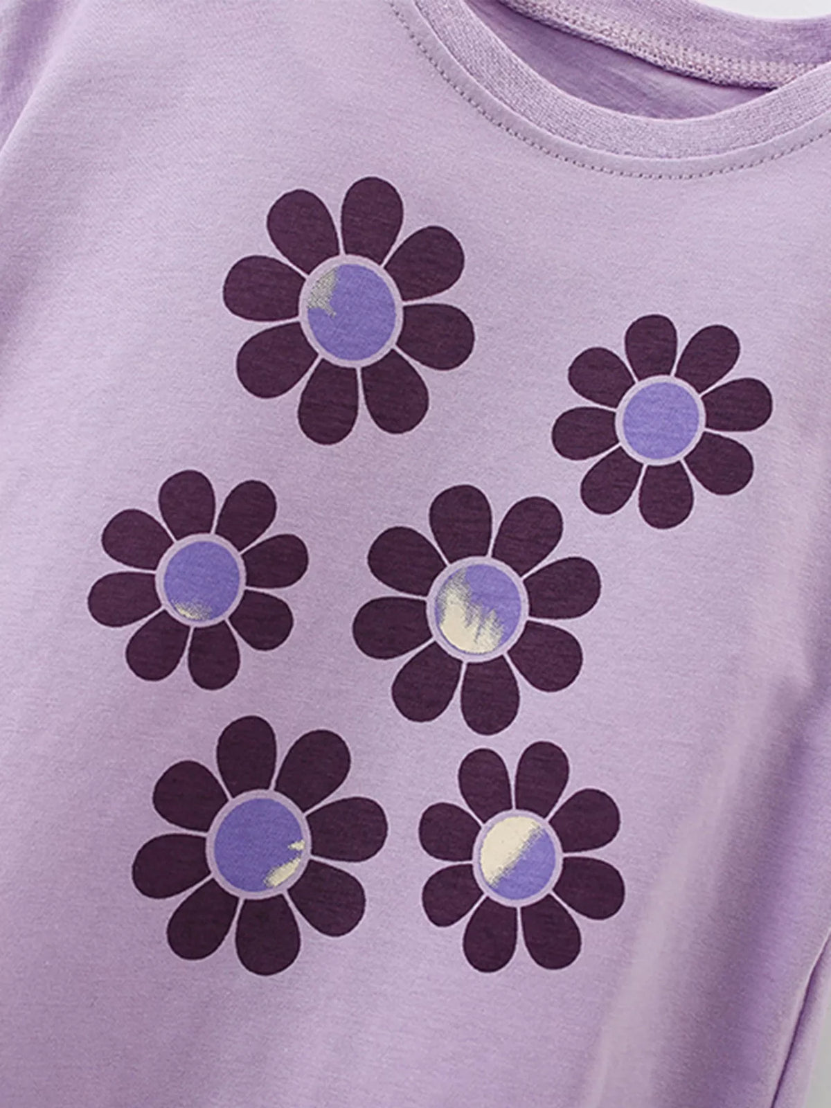 Lavender flower graphic shirt — purple flowers with reflective centers
