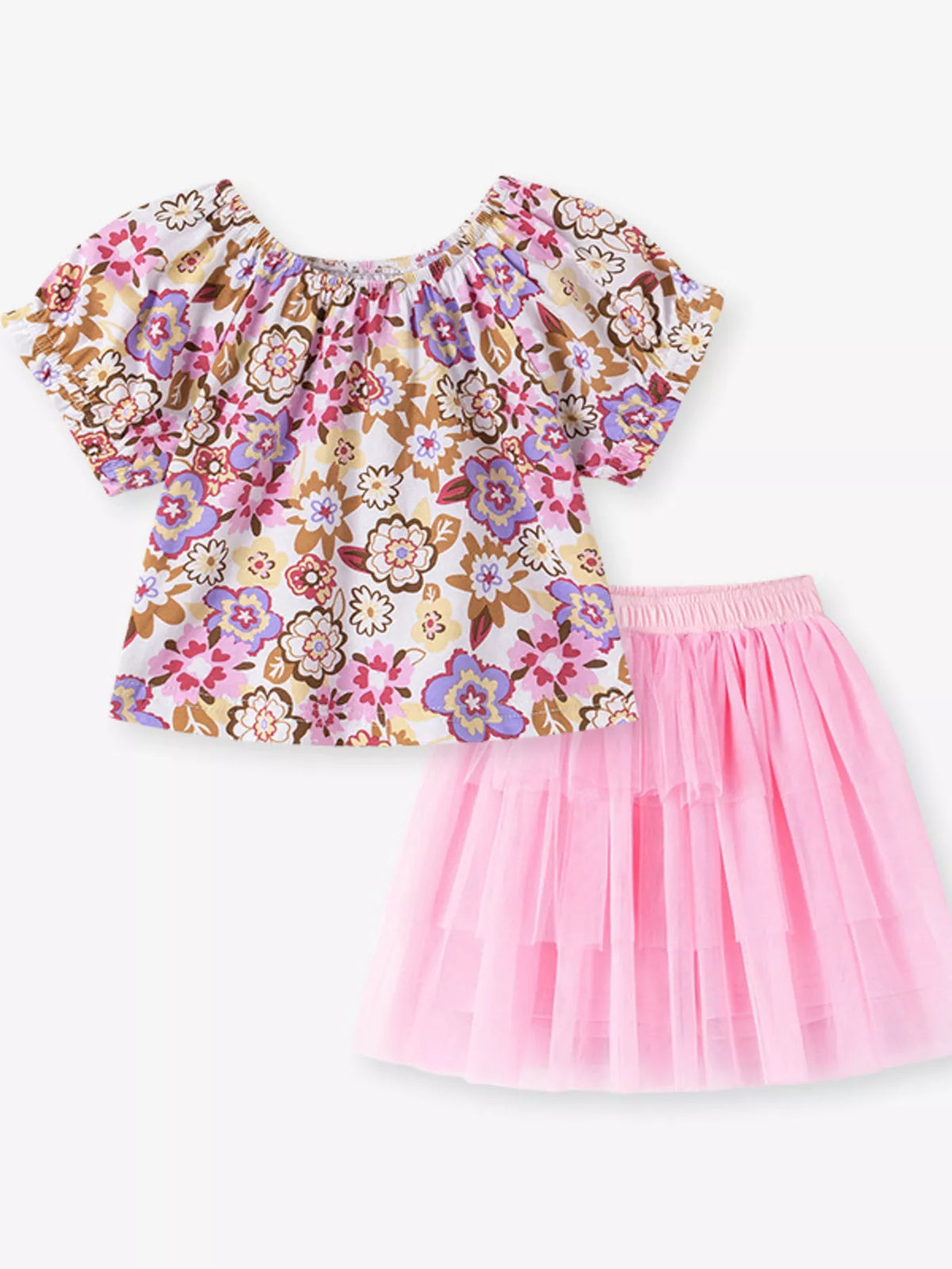 Multicolored floral top with a pink tiered tulle skirt laid flat