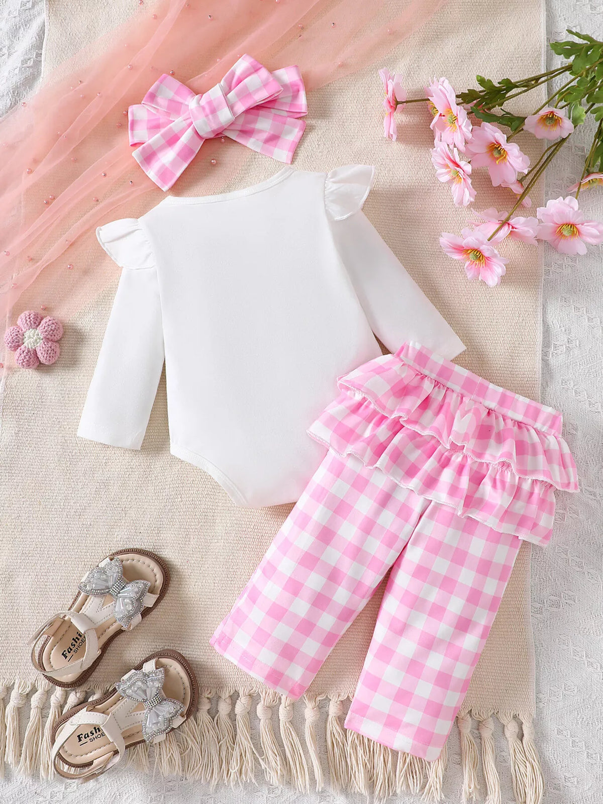 Back of the white bodysuit and pink gingham pants with headband