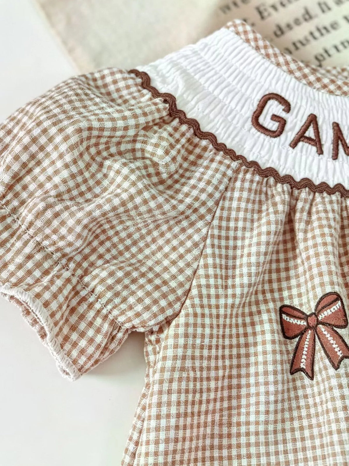 Gathered brown gingham puff sleeve