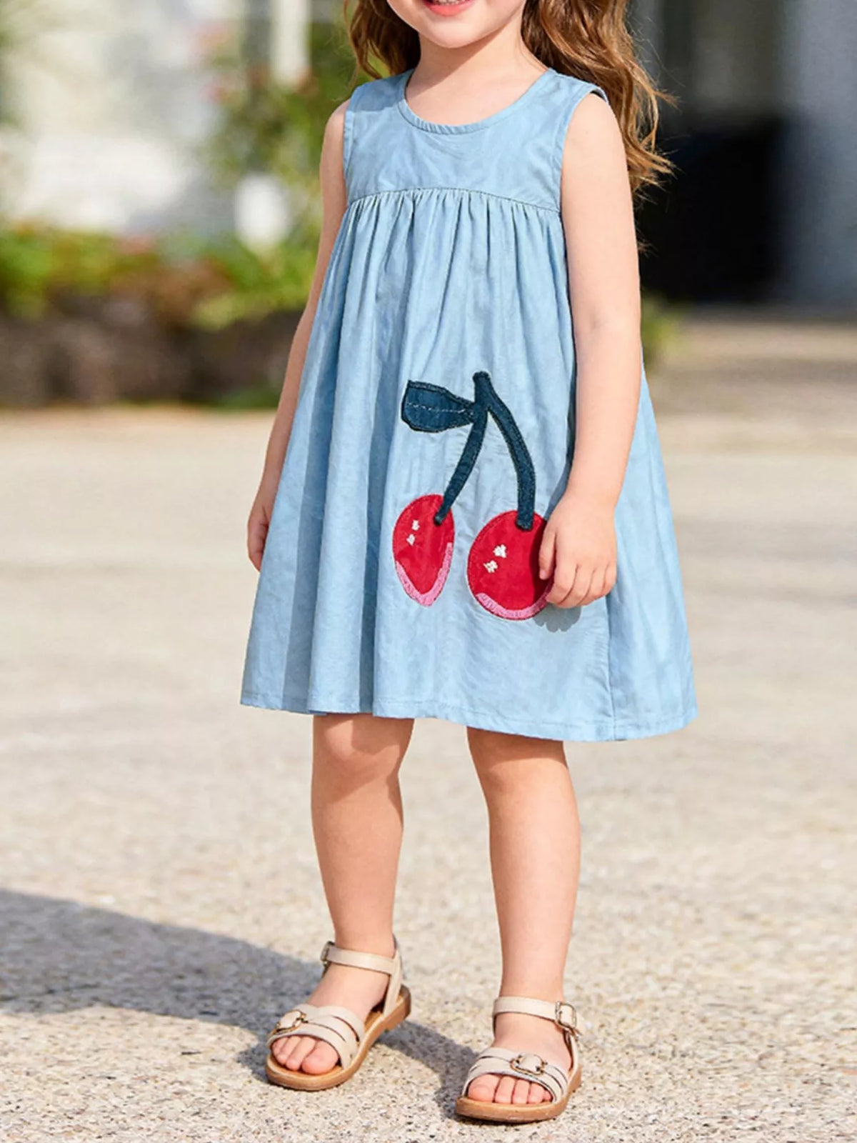 Blue Cherry Applique Sleeveless Dress — dress worn by a child