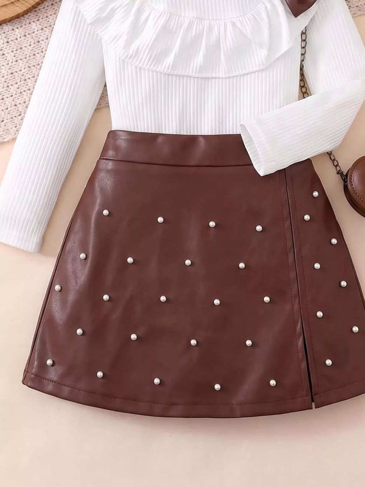 Brown skirt with small pearl-look embellishments