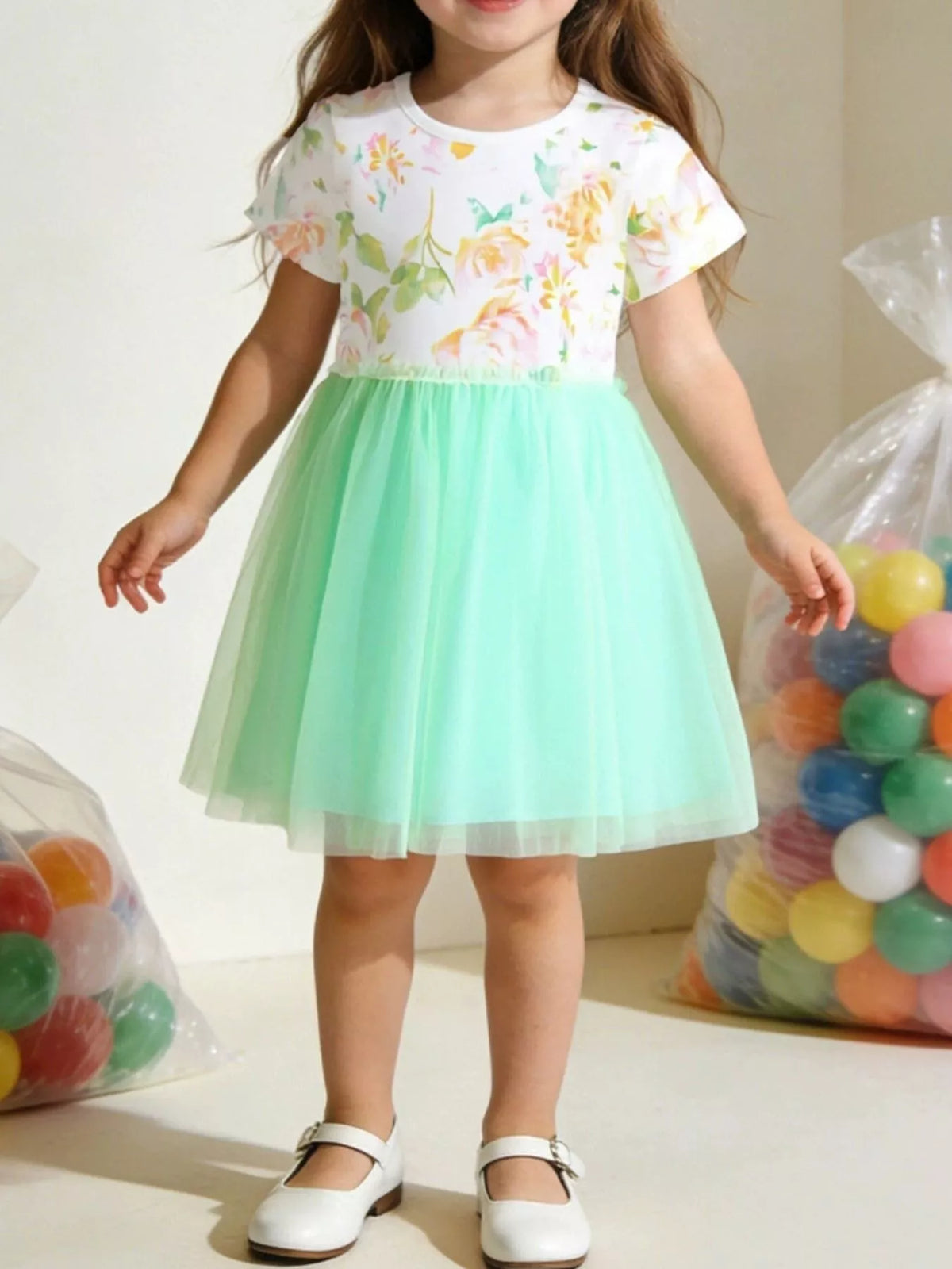 Floral Bodice Mint Tulle Dress — dress worn by a child