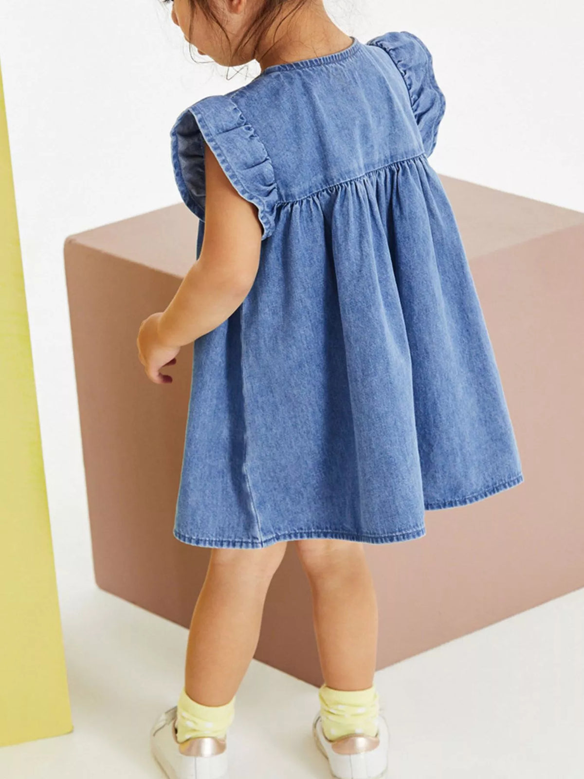 Pink Dinosaur Embroidered Denim Dress — dress worn by a child back