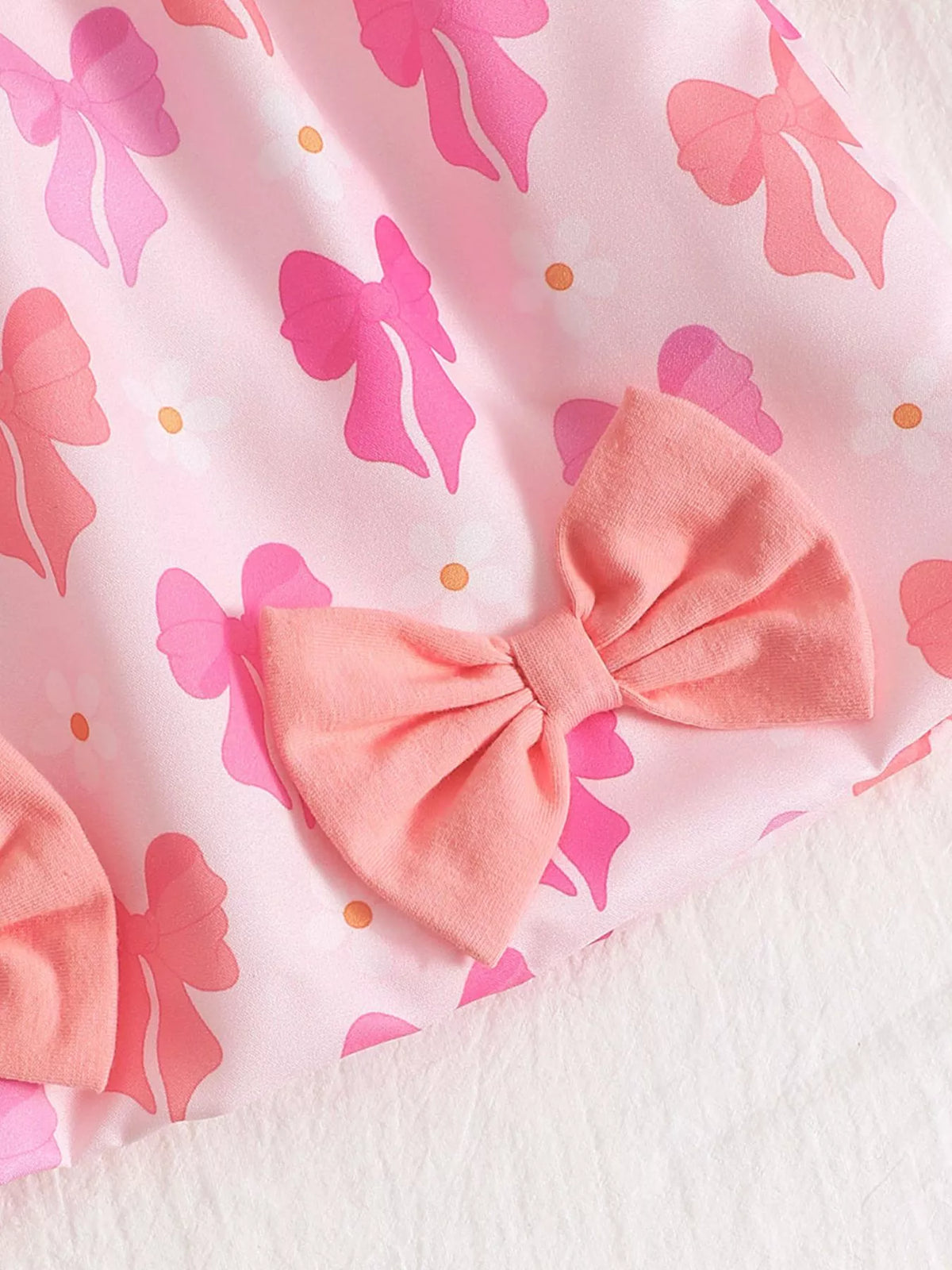 Baby Bow Front Printed Sundress — butterfly print and hem bow