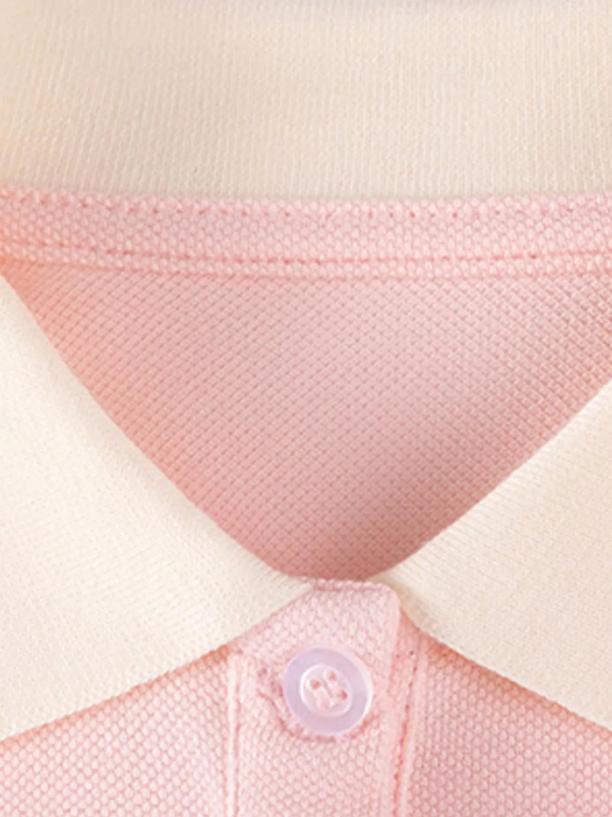 Cream polo collar and pink button