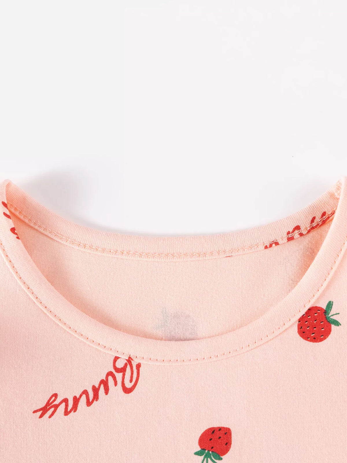 Peach round neckline and strawberry print