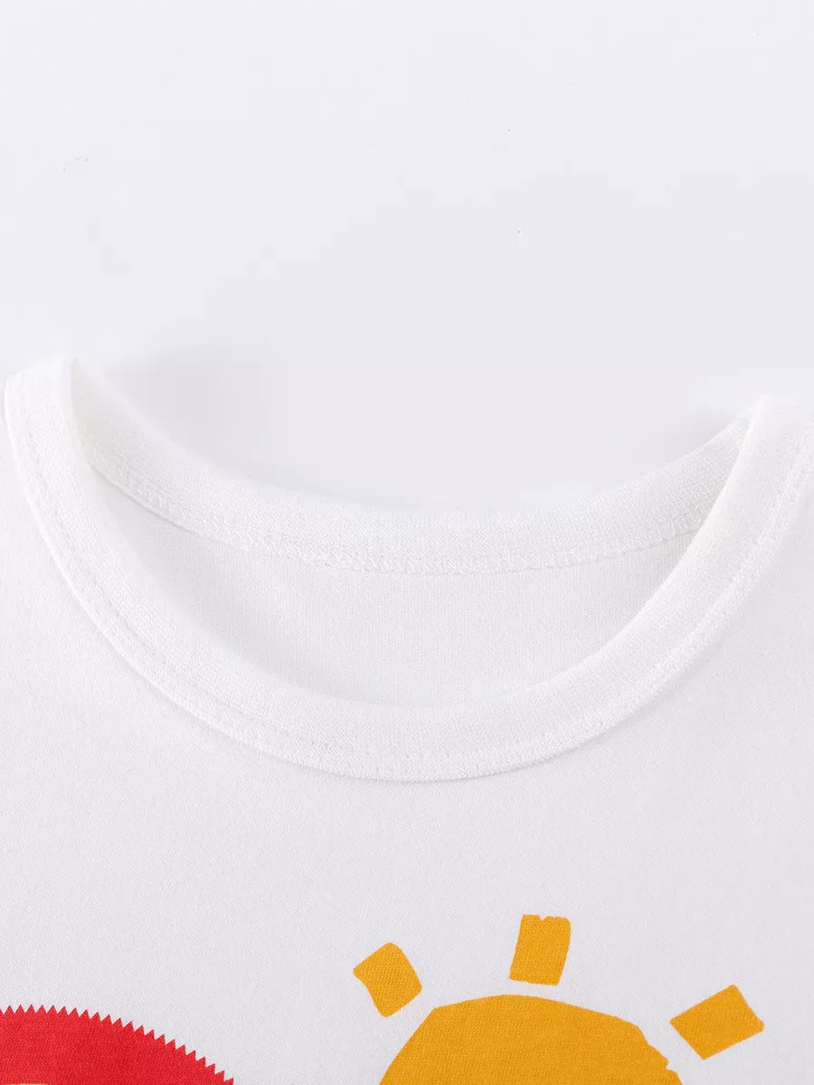 White round neckline above the cartoon graphic