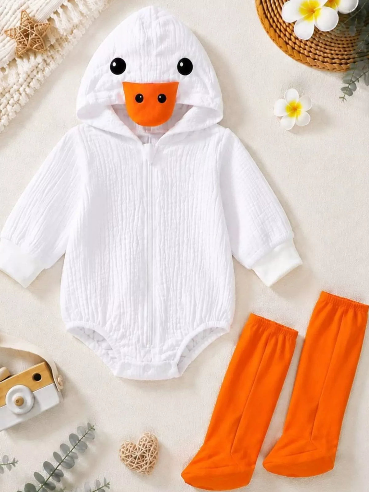 Baby Duck Hooded Bodysuit — bodysuit and orange footed accessories flat lay