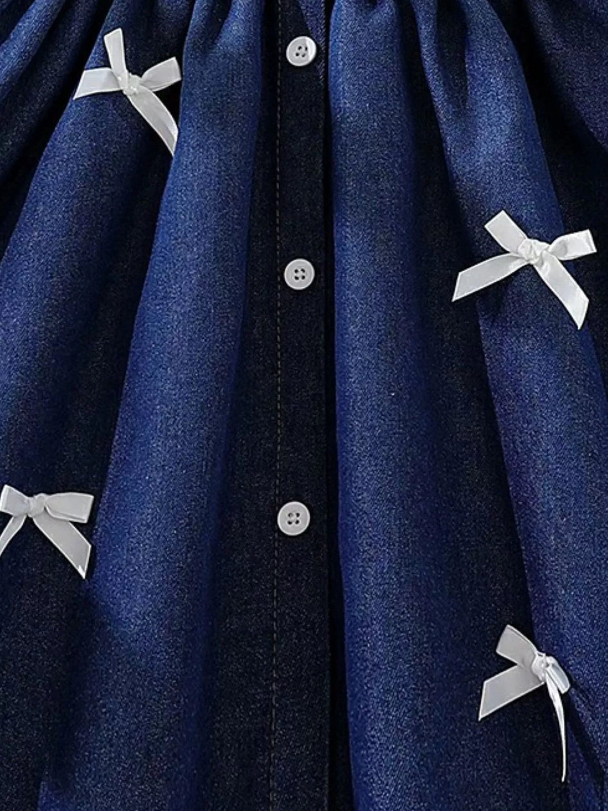 Sleeveless Denim Bow Dress — button front and bow details