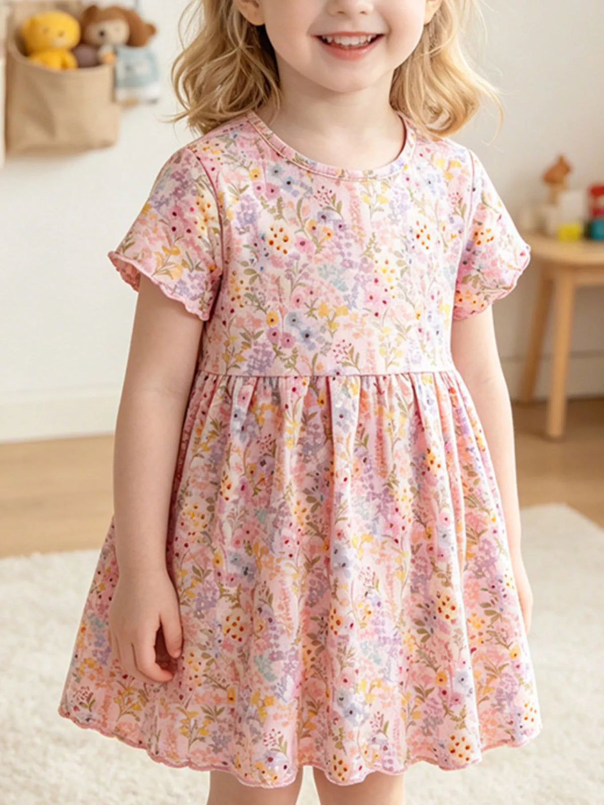 Pink floral short sleeve dress — dress shown on child