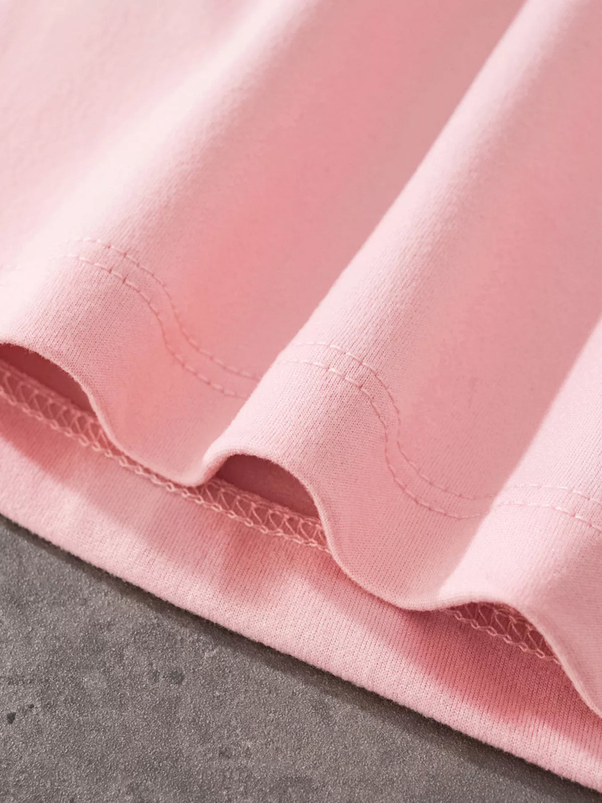 Pink three ballerinas graphic shirt — hem stitching