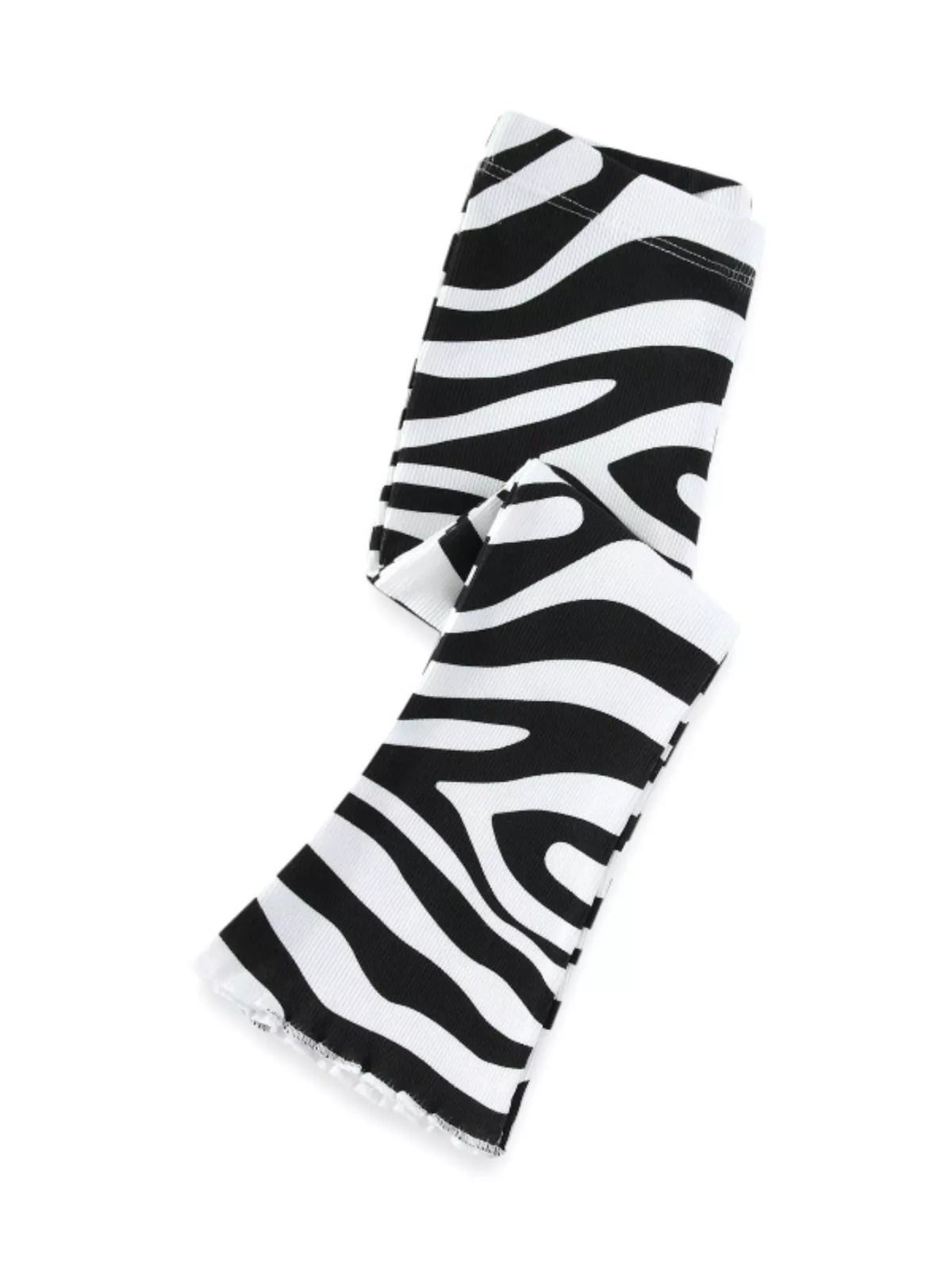 Zebra-print pants folded with one leg extended