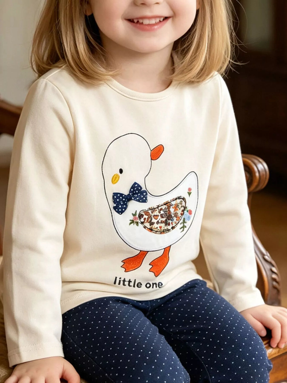 Top on a seated child