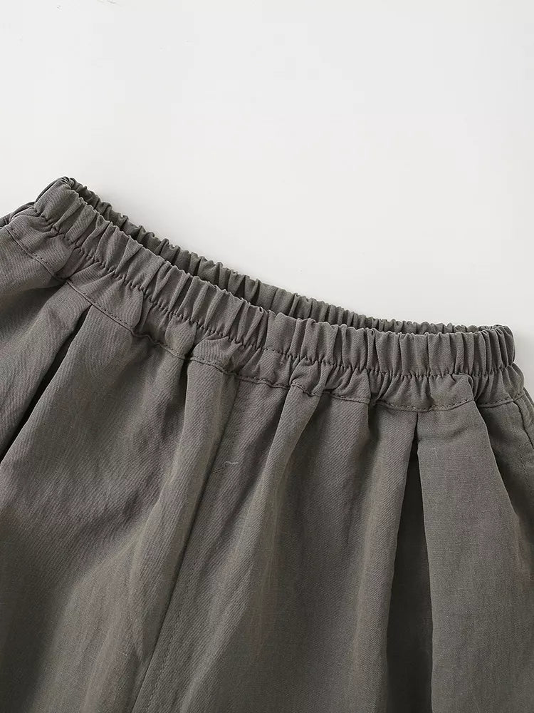 Gathered elastic waistband and front pleats