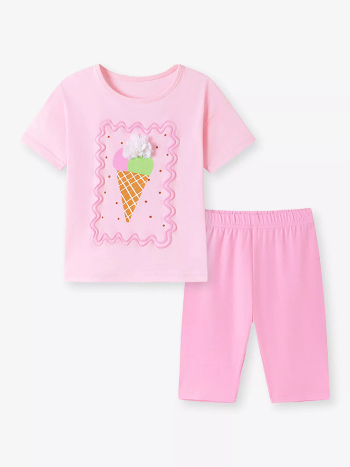 Pink ice-cream tee with pink capri leggings laid flat