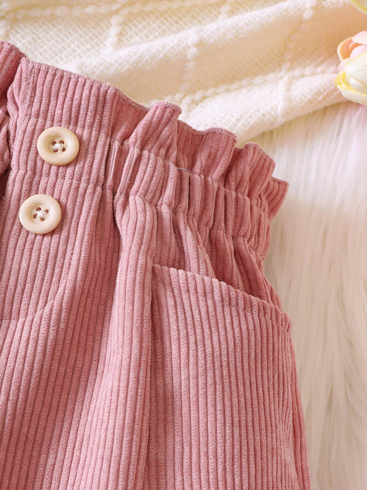 Pink pocket opening and gathered waistband