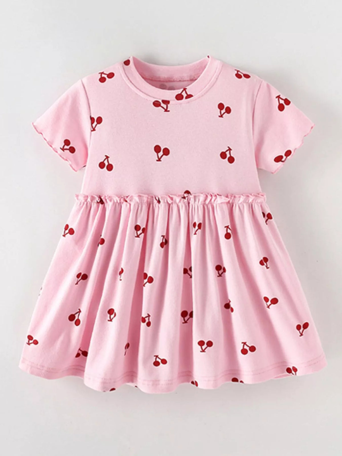 Pink cherry-print short-sleeve dress laid flat
