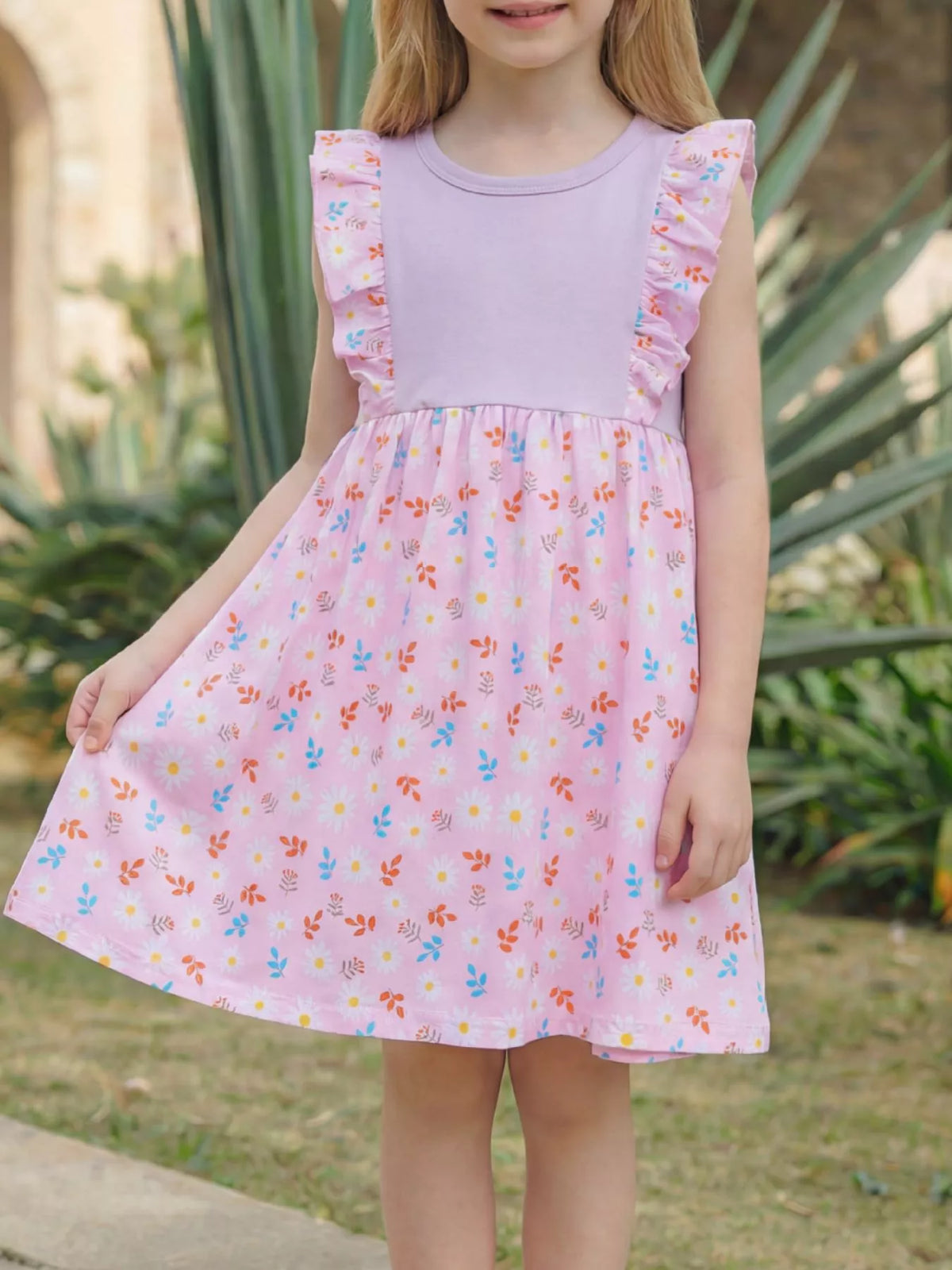 Lavender-bodice dress with pink floral shoulder ruffles and skirt on a child