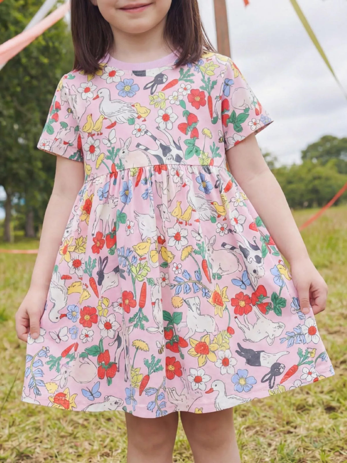Pink Bunny and Floral Print Dress — dress worn by a child