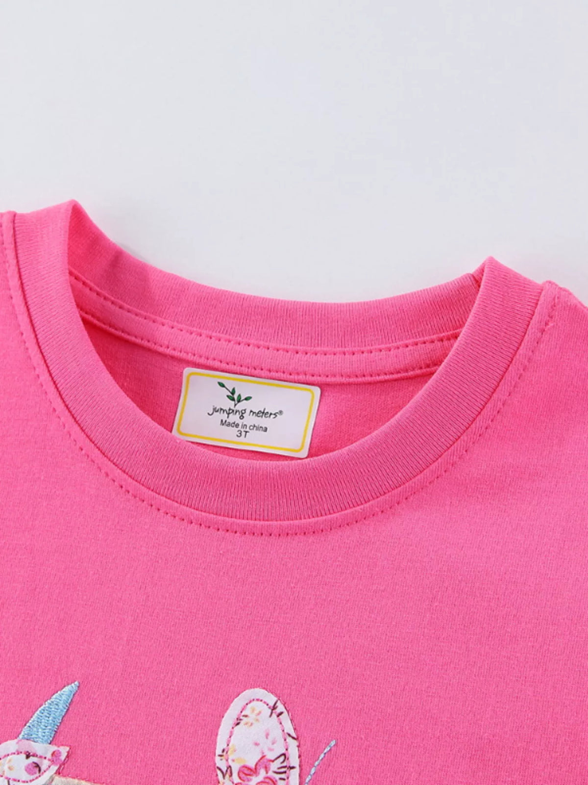 Hot pink unicorn butterfly applique ruffle trim shirt — round neckline