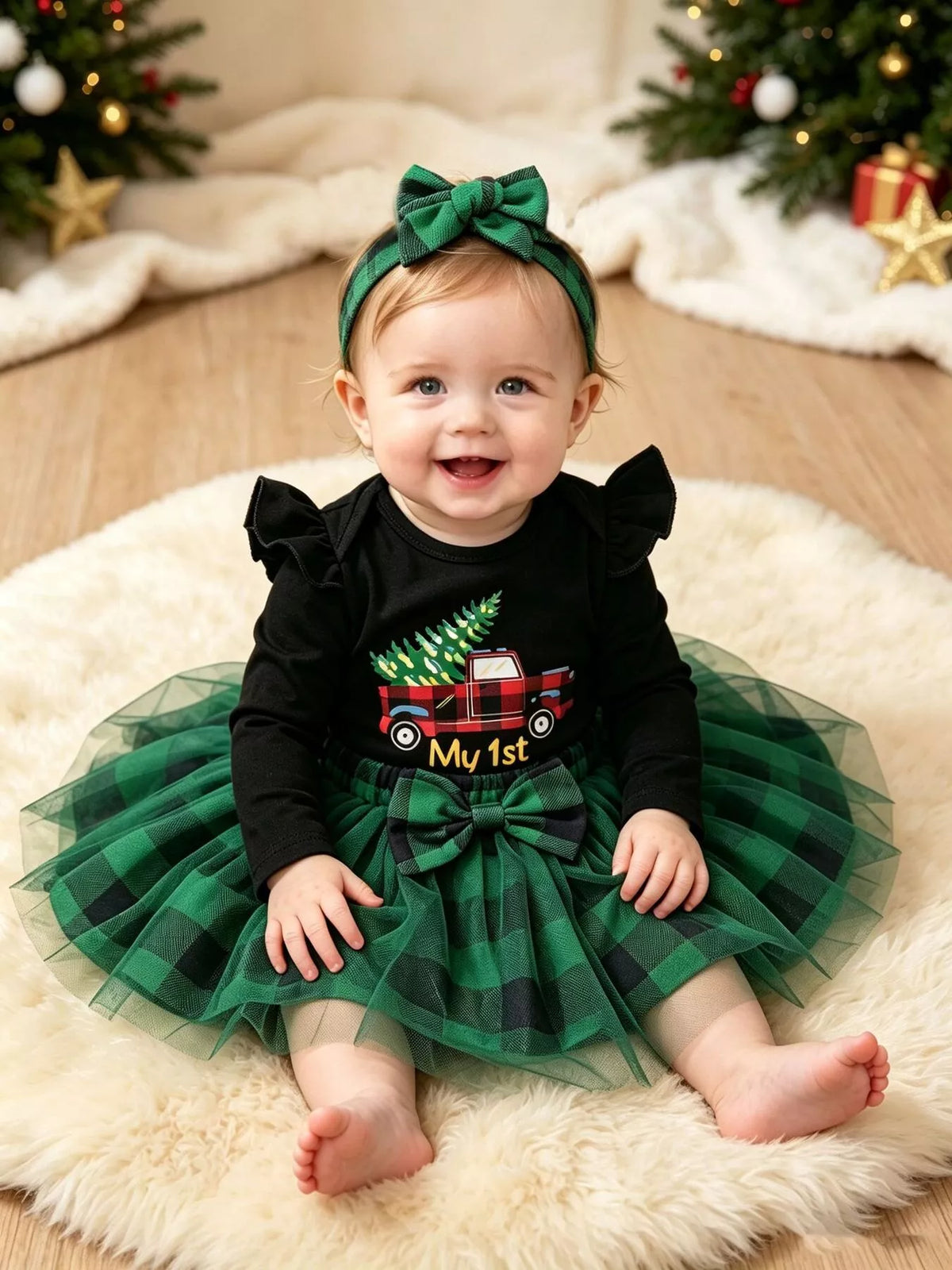 Black My 1st Christmas top and green plaid tulle skirt with headband — outfit shown on baby