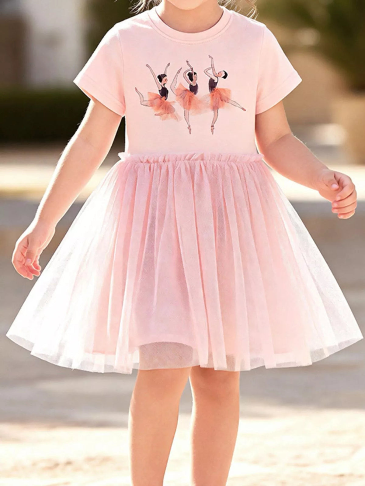 Pink ballerina short-sleeve dress with a tulle skirt on a child