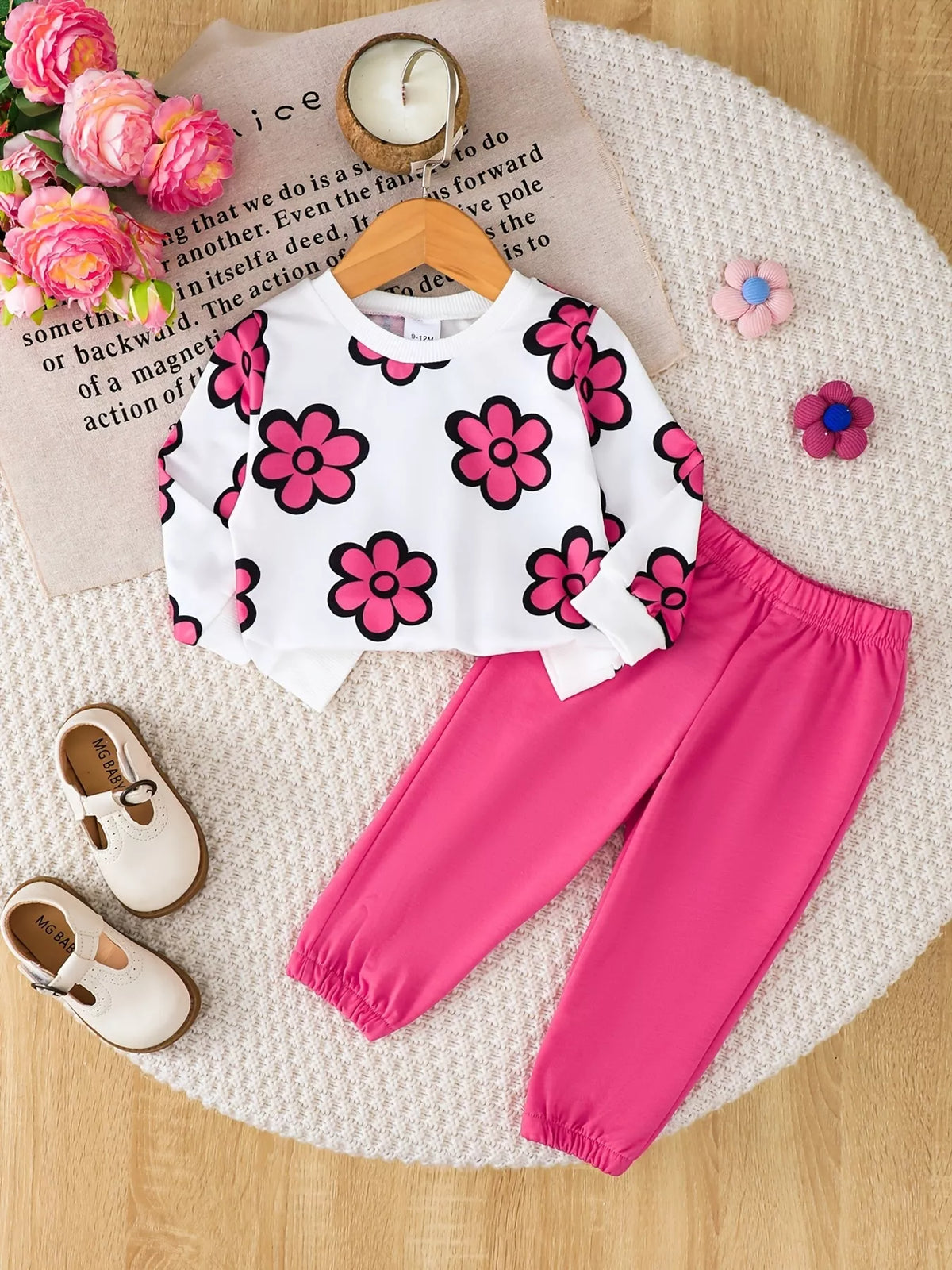 Floral sweatshirt and joggers set — pink floral outfit laid flat