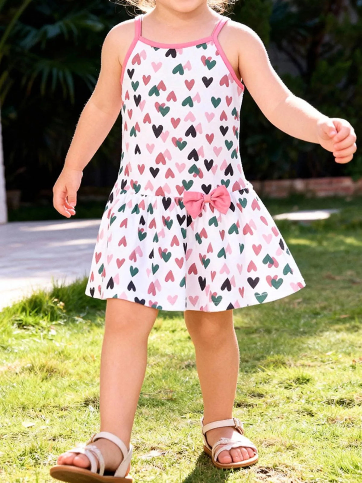 White heart-print dress on a child