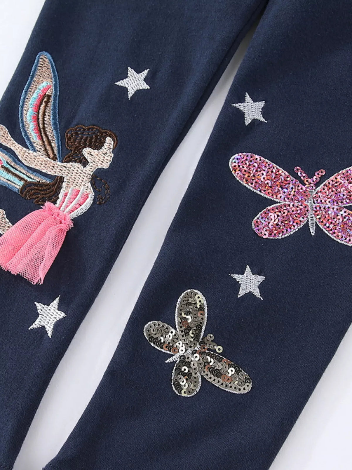 Fairy, stars and sparkling butterflies on navy fabric