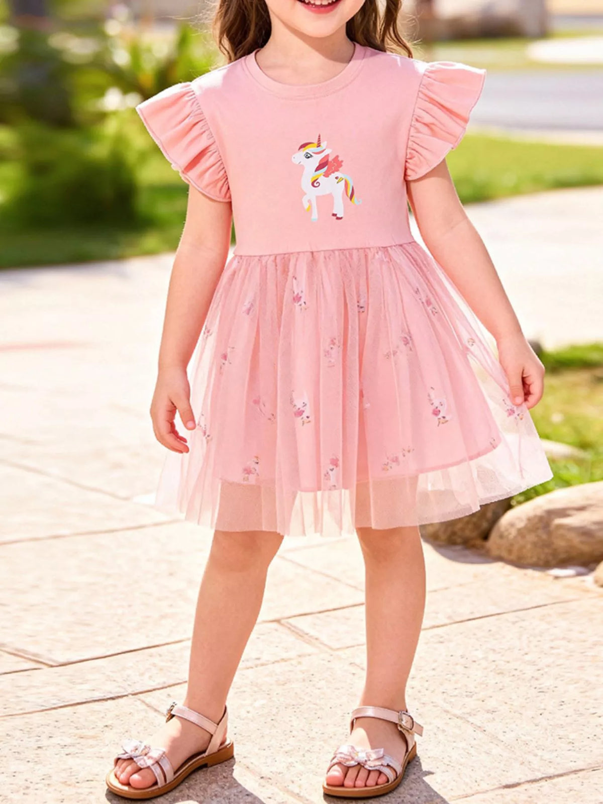 Pink winged-unicorn ruffle-sleeve dress with a tulle skirt on a child