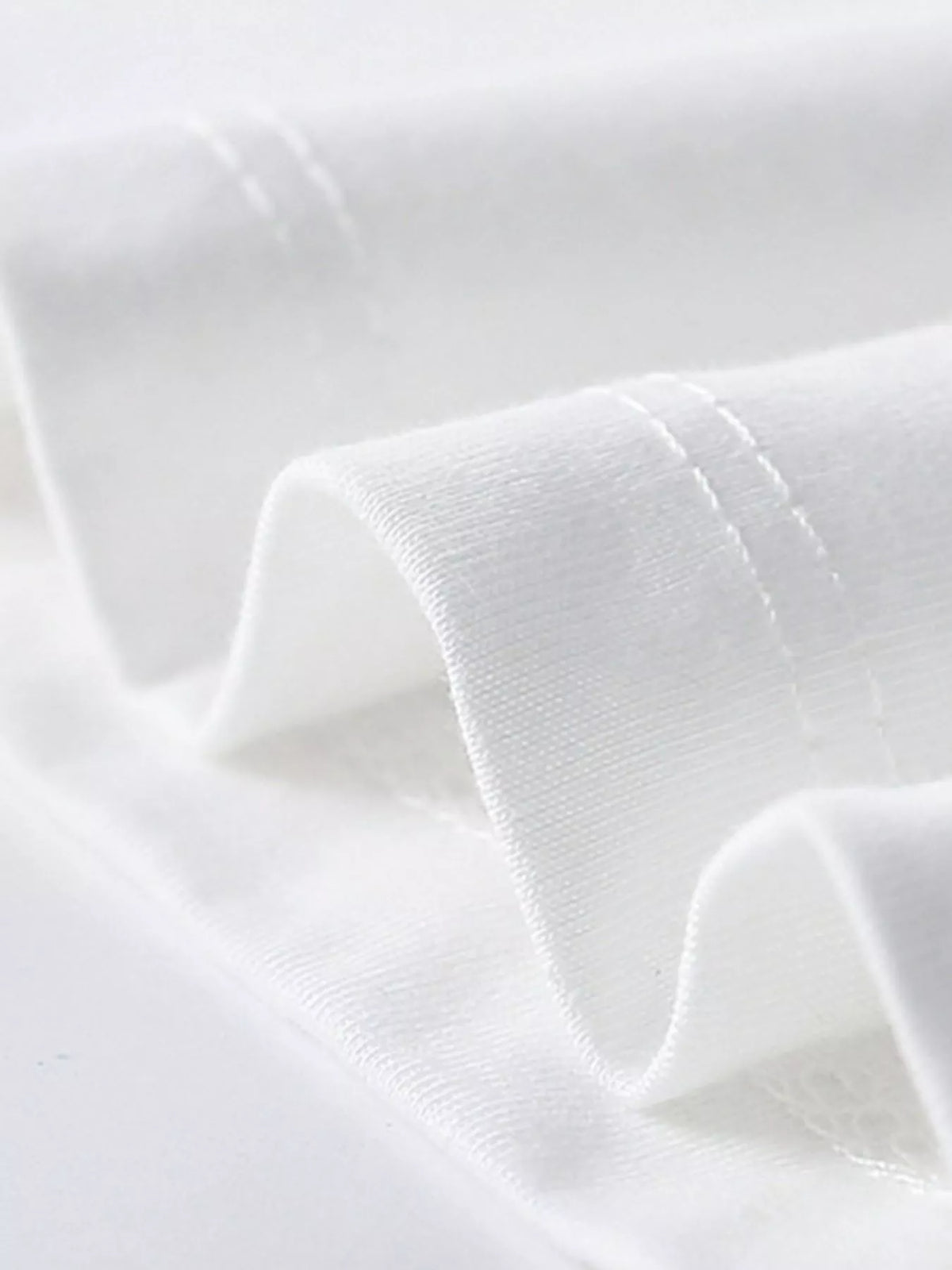 White dressed rabbit graphic shirt — hem stitching