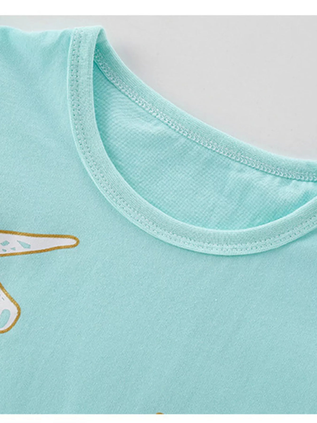 Turquoise floral unicorn ruffle sleeve top — round neckline