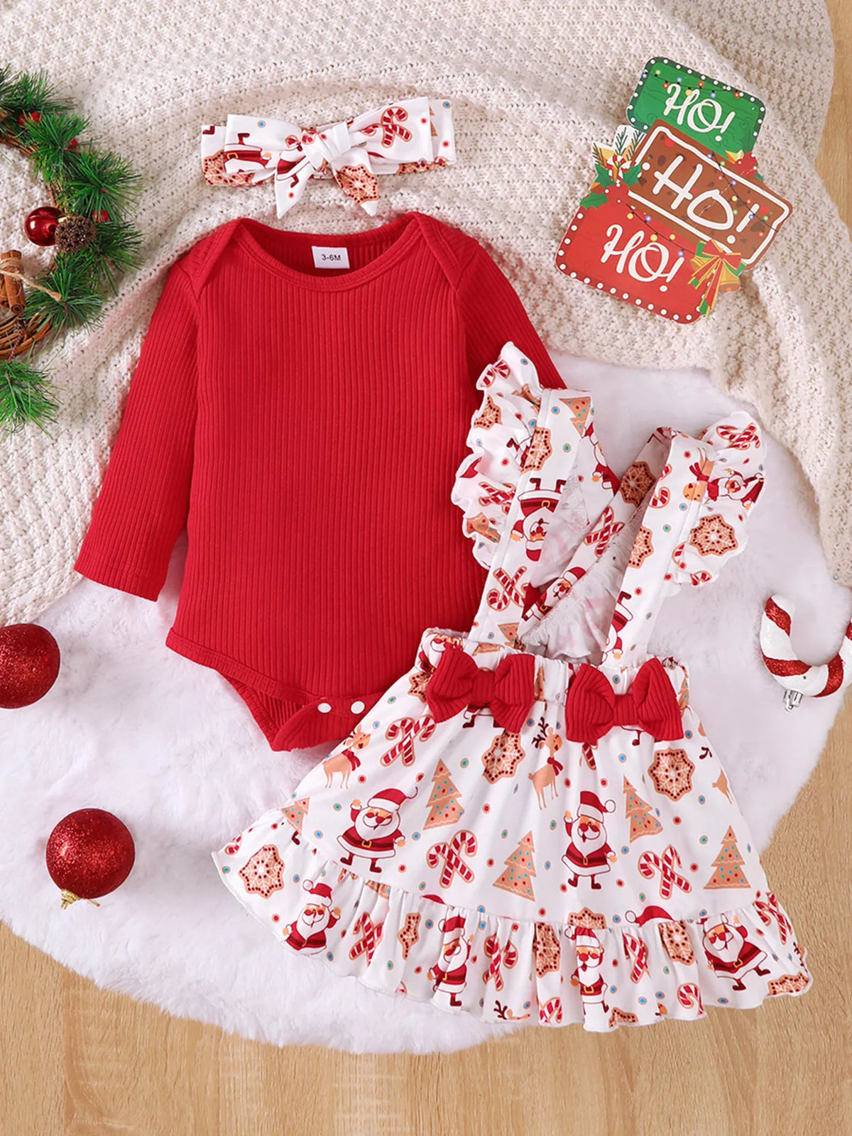 Red ribbed bodysuit Santa suspender skirt and headband — bodysuit skirt and headband separated