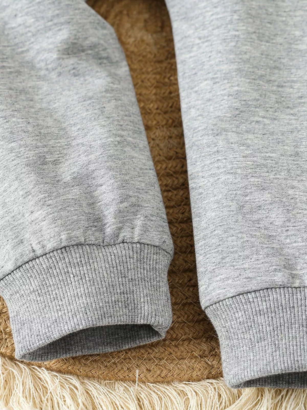 Gray ribbed pant cuffs