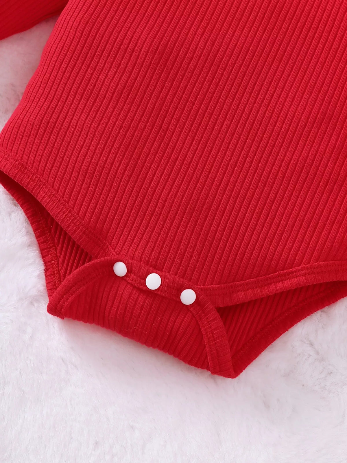Red ribbed bodysuit Santa suspender skirt and headband — bodysuit bottom snaps