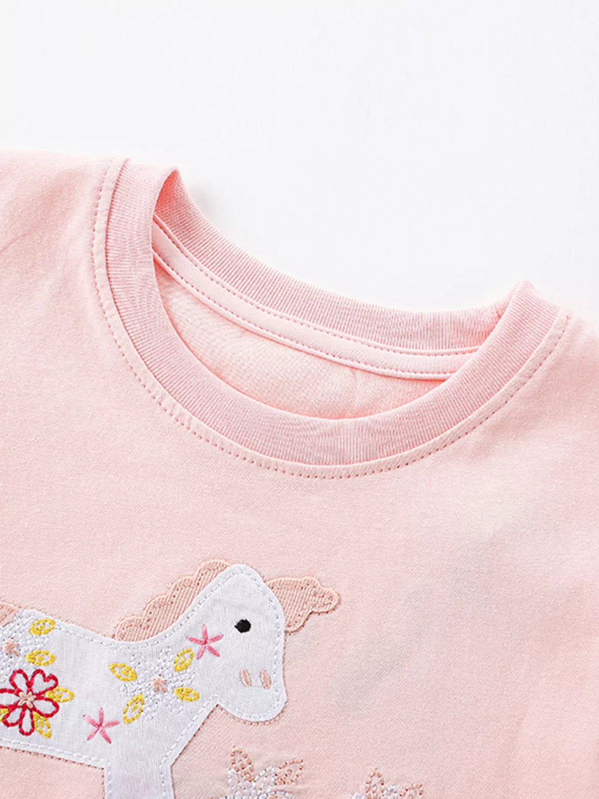Pink Unicorn Floral Ruffle Sleeve Dress — round neckline detail