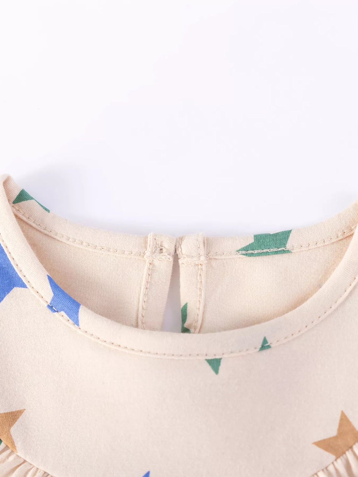 Round neckline and back opening