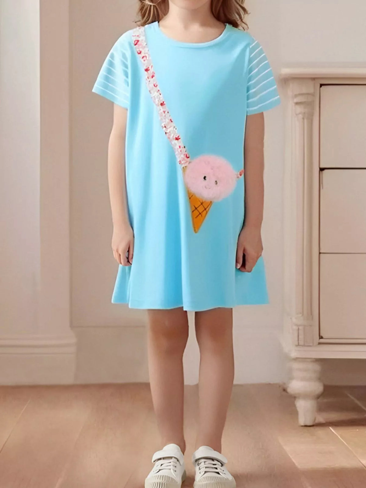 Blue short-sleeve dress with a pink ice-cream applique on a child