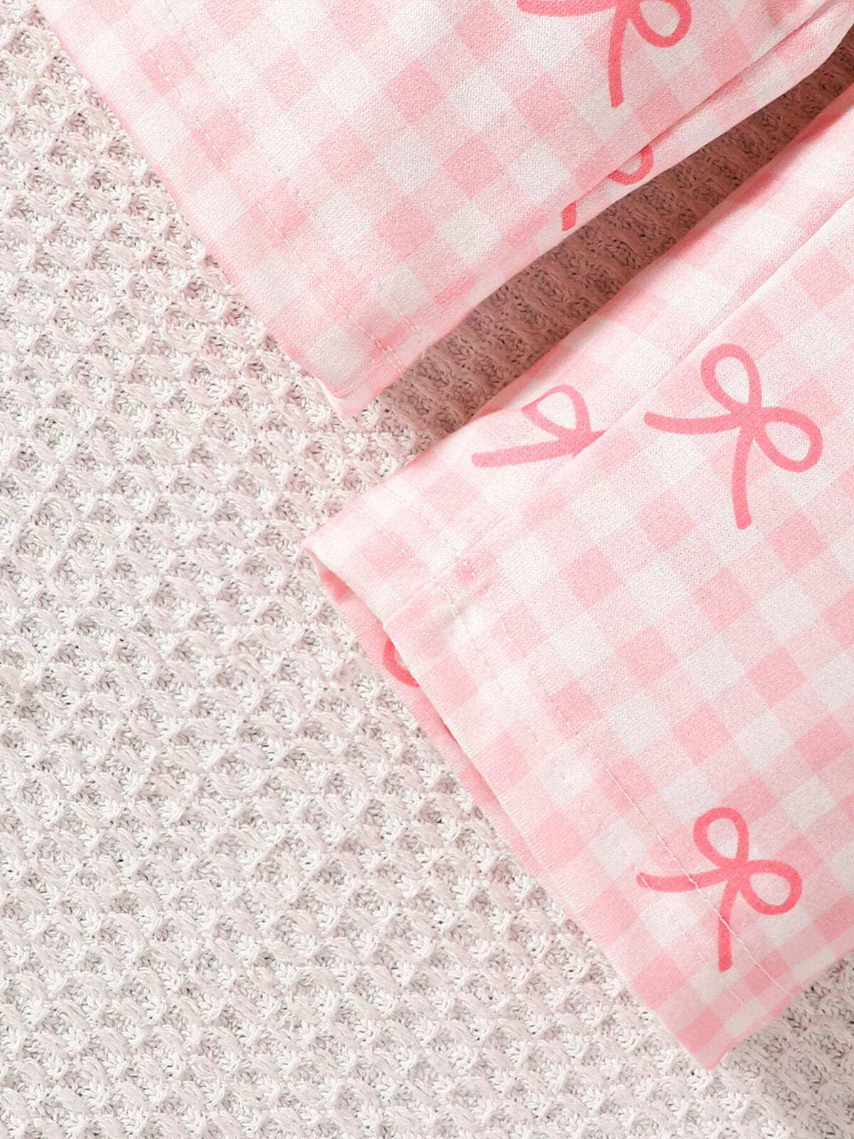 Pink bow print and stitched gingham pant hem