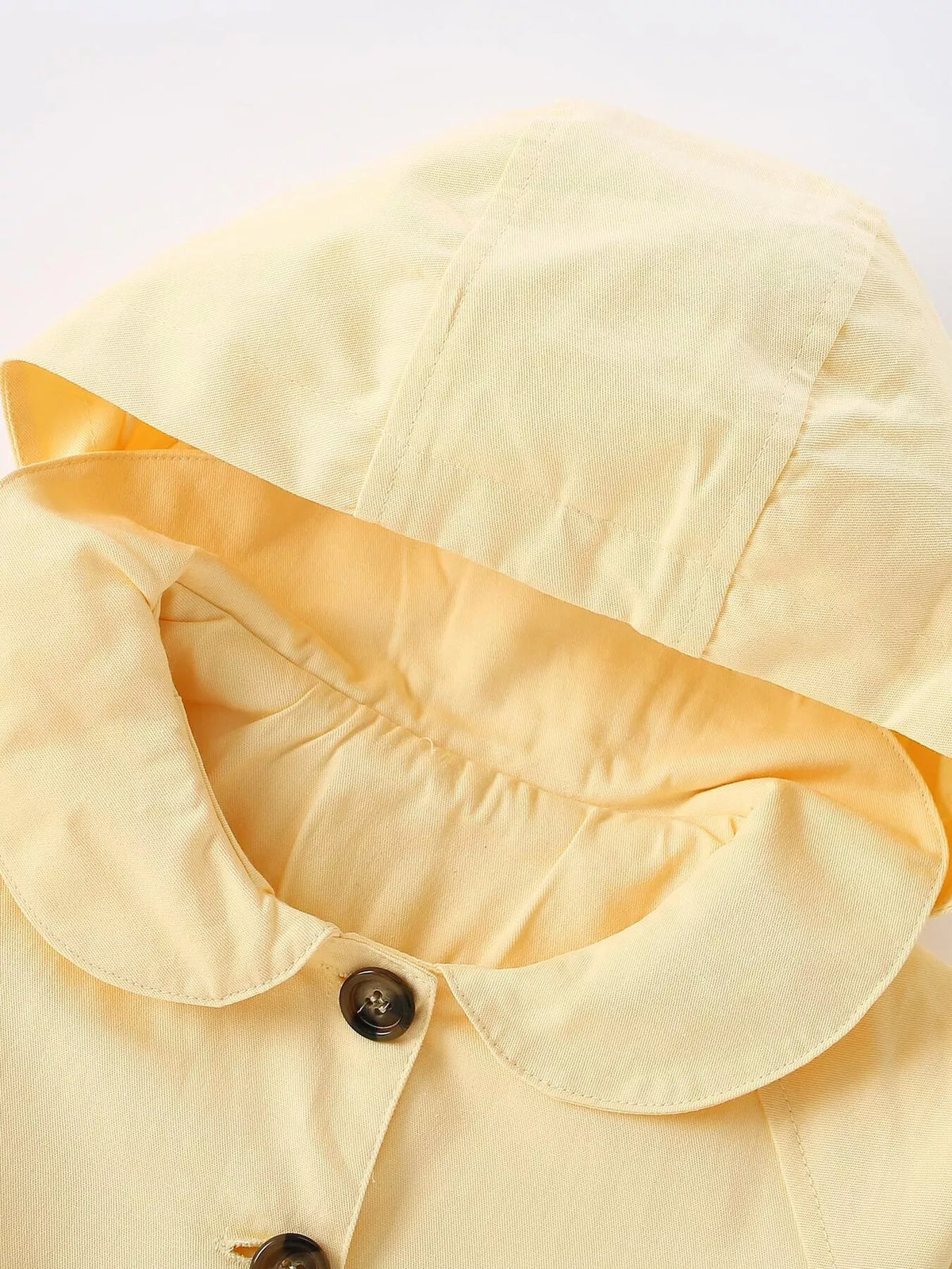 Yellow hood above a rounded collar