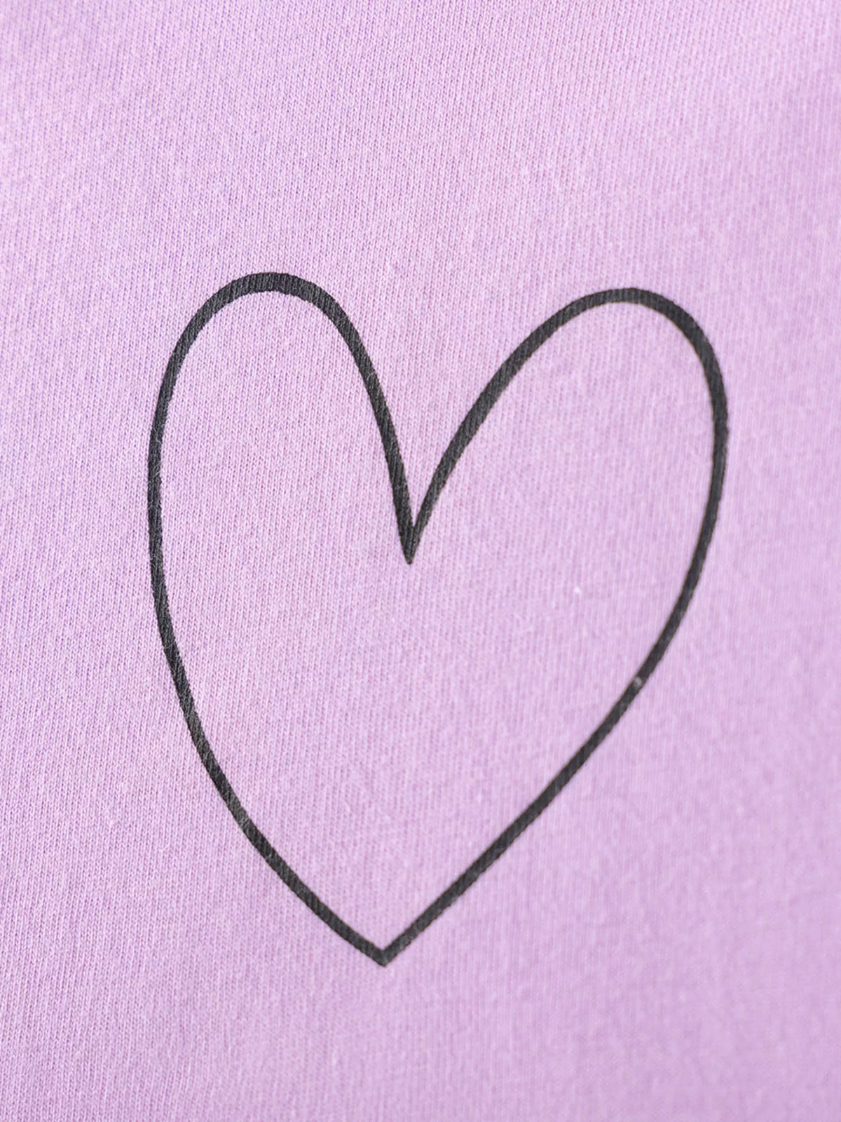 Outlined heart on the lavender bodice
