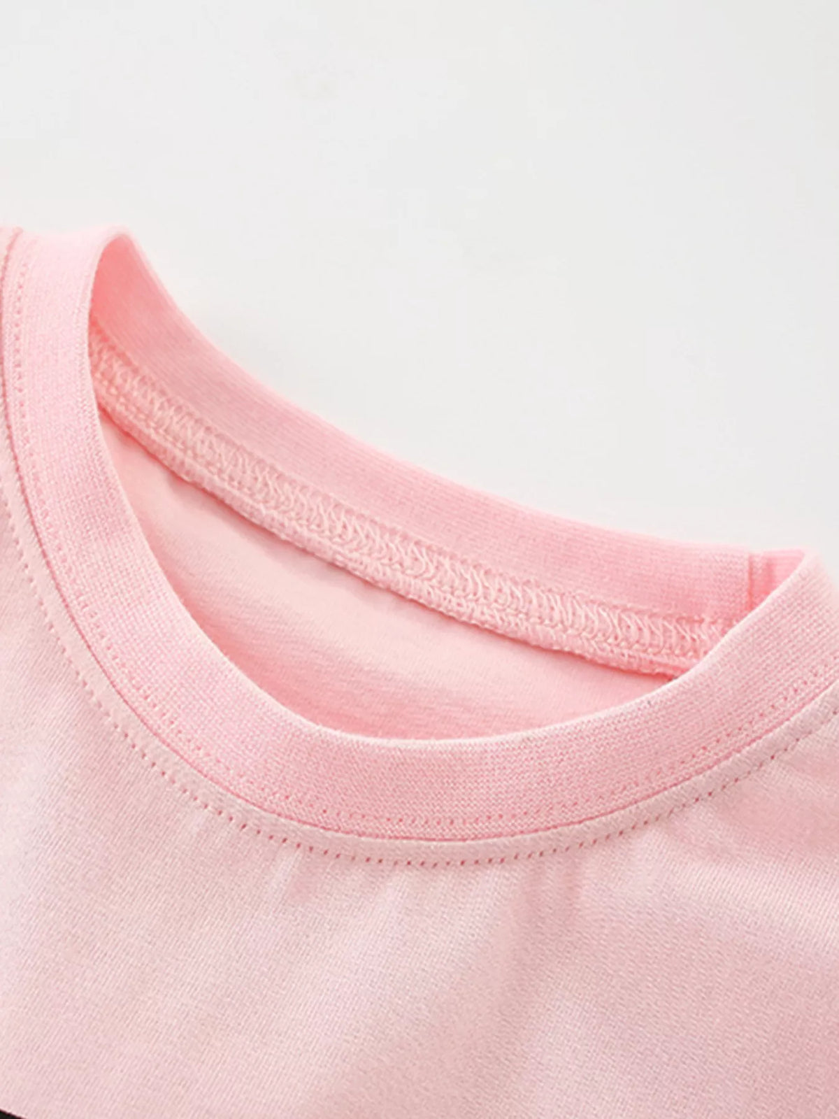 Pink sunglasses cat graphic shirt — round neckline