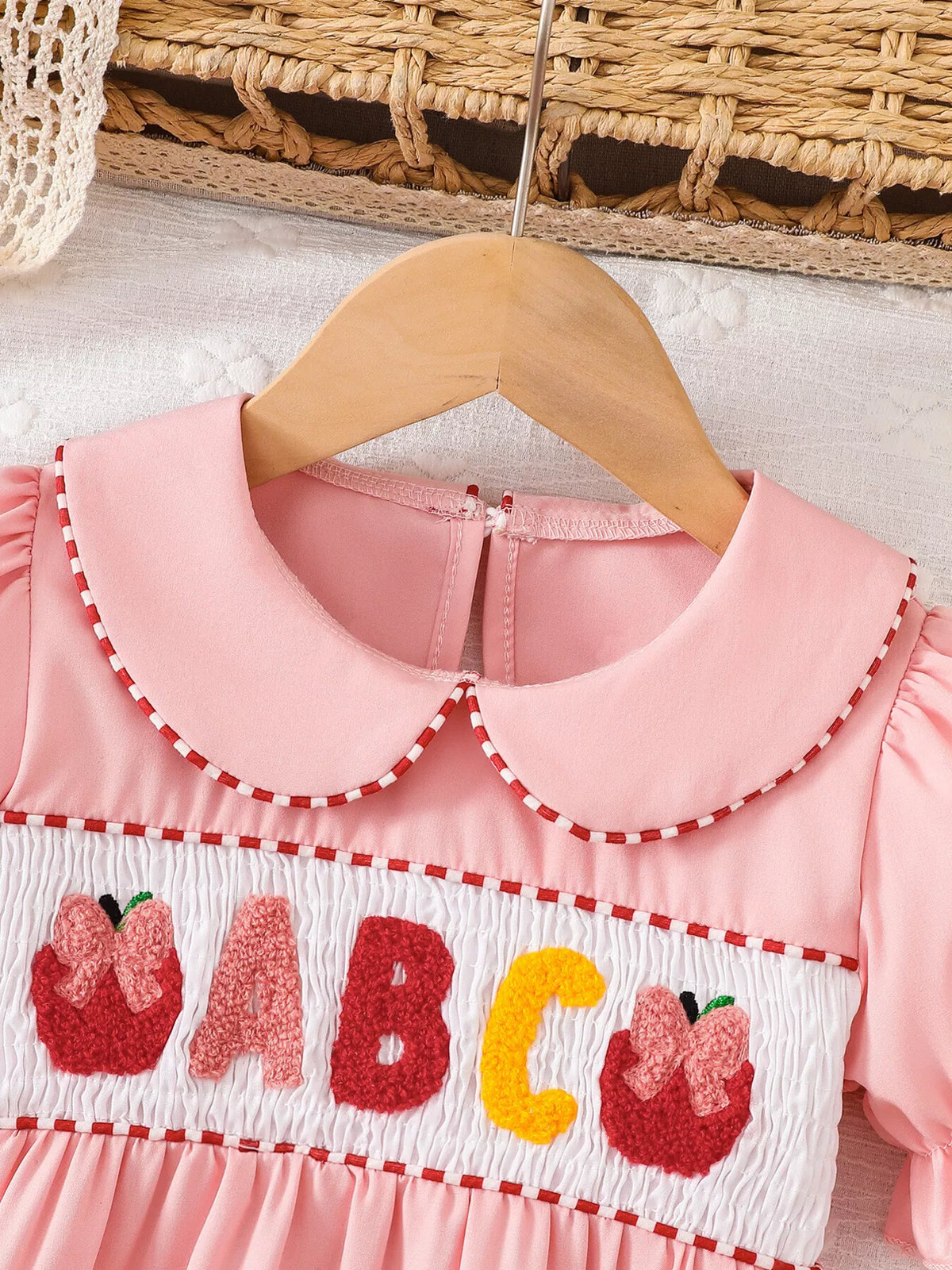 Pink rounded collar with red edging