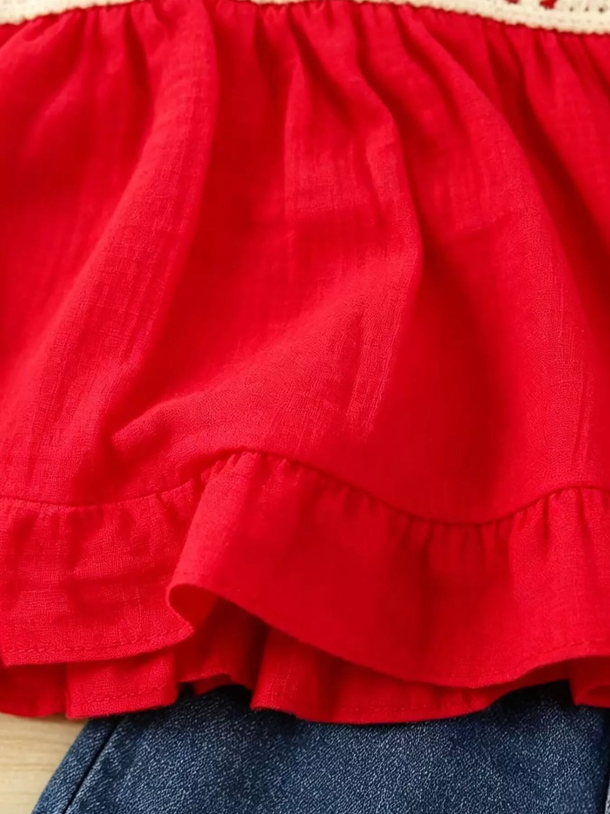 Gathered red ruffle hem