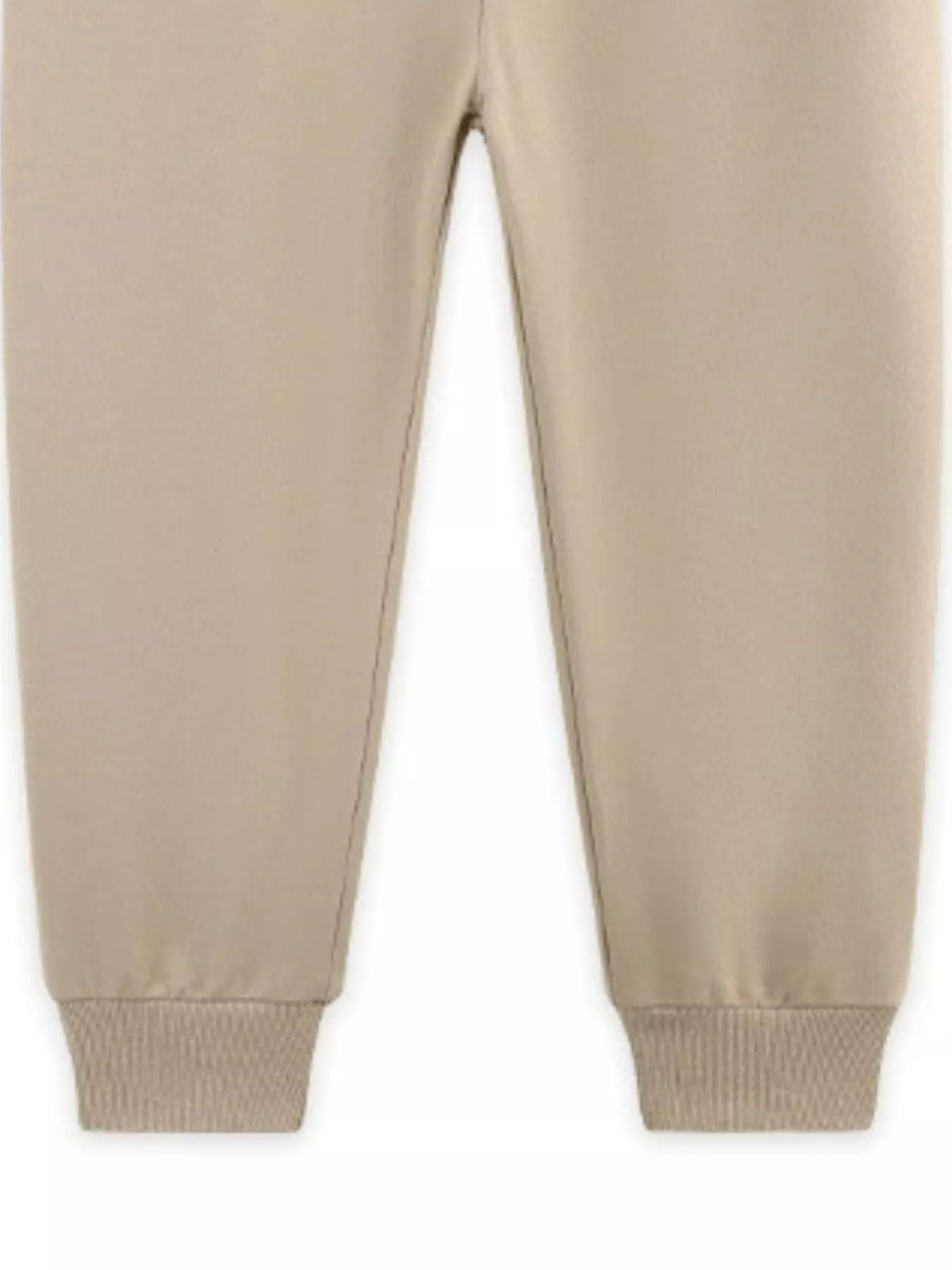 Tan jogger legs with ribbed cuffs