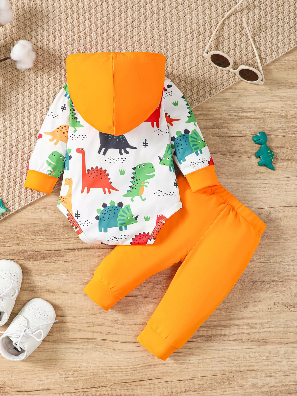 Dinosaur Wild Boy hooded bodysuit and orange pants — outfit back